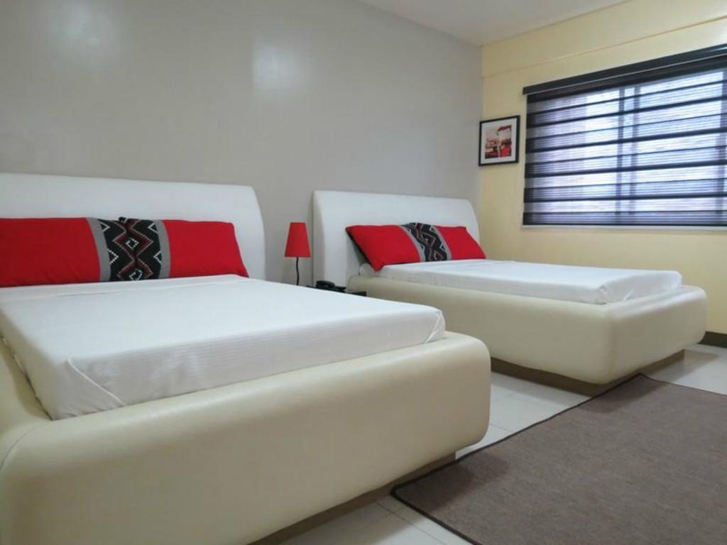 Hotel Cara Lipa City Quarto foto